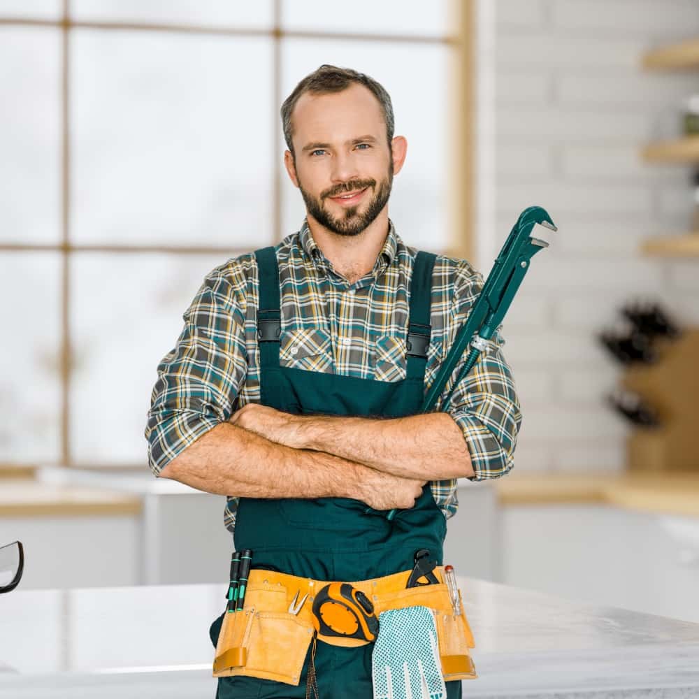Plumber holding a wrench